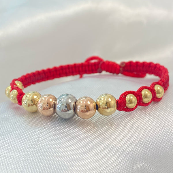 PULSERA ROJA ENTRETEJIDA CON CENTRO DE 3 TONOS