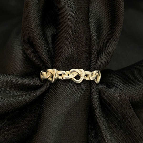 ANILLO DE CORAZONES TRENZADO
