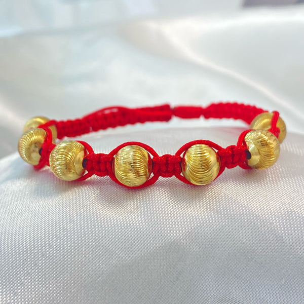 PULSERA ROJA ENTRETEJIDA CON BALIN GRABADO