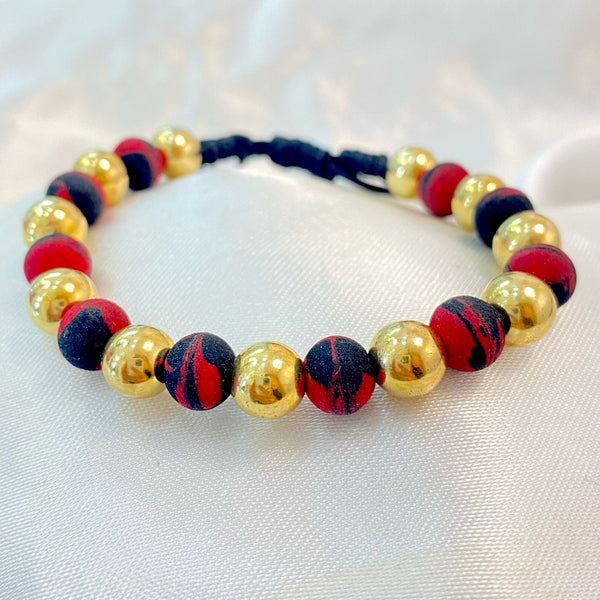 PULSERA NEGRA Y ROJA MEZCLADA CON BALIN