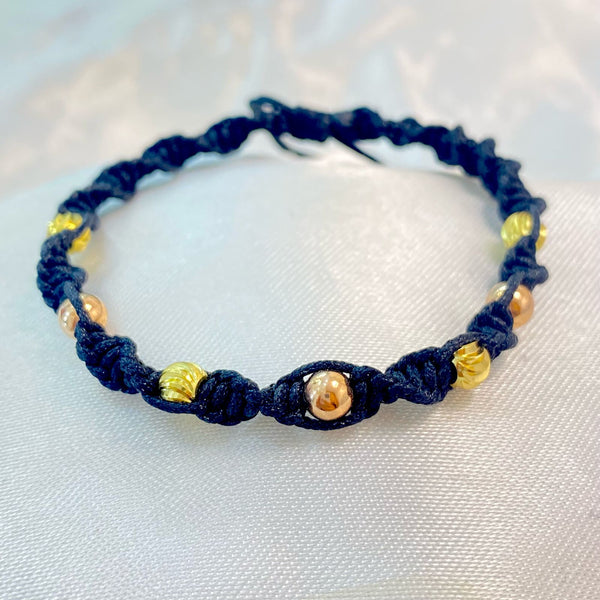 PULSERA NEGRA TEJIDA ENTORCHADA CON BALIN MEZCLADO