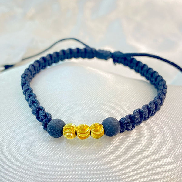 PULSERA NEGRA TEJIDA CON NEOPRENO Y CENTRO DE BALIN DIAMANTADO