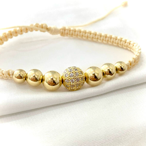 PULSERA BEIGE BOLA DE FUEGO